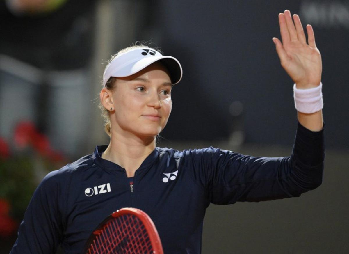 Kazakhstan's Elena Rybakina celebrates after winning against Czech Republic's Karolina Pliskova during the ATP Rome Open tennis tournament at Foro Italico in Rome on May 11, 2026.   Tiziana FABI / AFP
