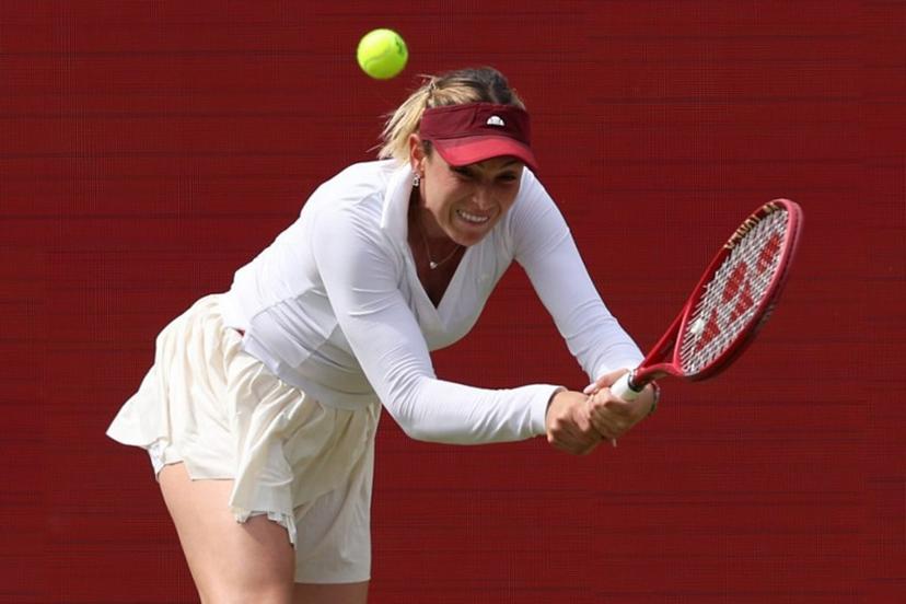 Croatia's Donna Vekic returns to Britain's Emma Raducanu during their women's singles final tennis match at the HSBC WTA Championships at Queen's Club in west London on June 14, 2026.  Adrian Dennis / AFP