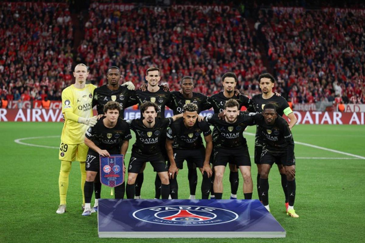 Paris Saint-Germain's Russian goalkeeper #39 Matvey Safonov, Paris Saint-Germain's Portuguese midfielder #87 Joao Pedro Goncalves Neves, Paris Saint-Germain's Ecuadoran defender #51 Willian Pacho, Paris Saint-Germain's Portuguese midfielder #17 Vitinha, Paris Saint-Germain's Spanish midfielder #08 Fabian Ruiz, Paris Saint-Germain's Portuguese defender #25 Nuno Mendes, Paris Saint-Germain's French midfielder #14 Desire Doue, Paris Saint-Germain's French midfielder #33 Warren Zaire Emery, Paris Saint-Germain's Georgian forward #07 Khvicha Kvaratskhelia, Paris Saint-Germain's Brazilian defender #05 Marquinhos and Paris Saint-Germain's French forward #10 Ousmane Dembele pose for a team photo prior to the start of the UEFA Champions League second-leg, semi-final football match between FC Bayern Munich and Paris Saint-Germain (PSG) in Munich, southern Germany on May 6, 2026.  Franck FIFE / AFP