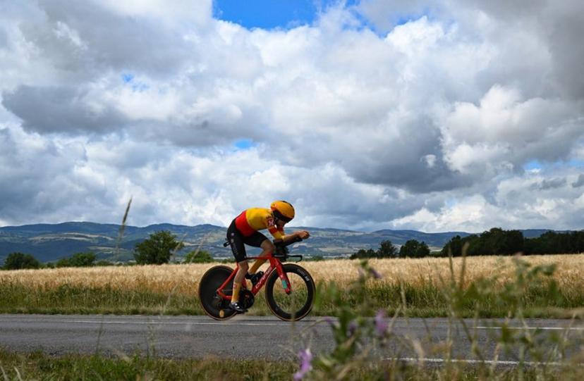 Uno-X Cycling team's Danish rider Anthon Charmig rides during the fourth stage of the 74th edition of the Criterium du Dauphine individual time trial cycling race, 31.9 km between Montbrison and La Batie d'Urfe, central eastern France, on June 8, 2022.  Marco BERTORELLO / AFP