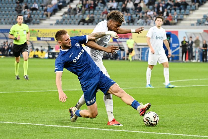 Gent's Siebe Van der Heyden and Union's Kevin Rodriguez fight for the ball during a soccer match between KAA Gent and Royale Union Saint-Gilloise, Thursday 21 May 2026 in Gent, on the ninth day of the Champion's Play-offs of the 2025-2026 'Jupiler Pro League' first division of the Belgian championship. BELGA PHOTO MAARTEN STRAETEMANS