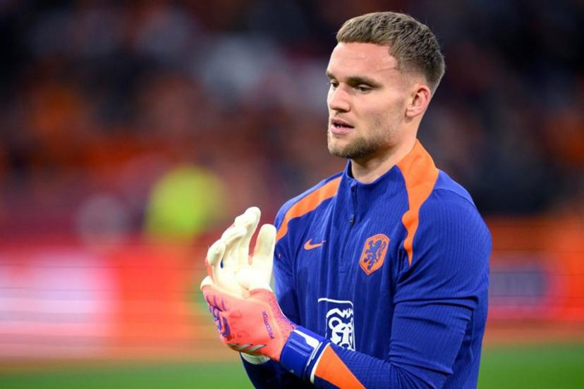 Netherlands' goalkeeper Bart Verbruggen looks on during warm up prior to the FIFA World Cup 2026 Group G European qualification football match between the Netherlands and Lithuania at the Johan Cruijff Arena, in Amsterdam, on November 17, 2025.  JOHN THYS / AFP