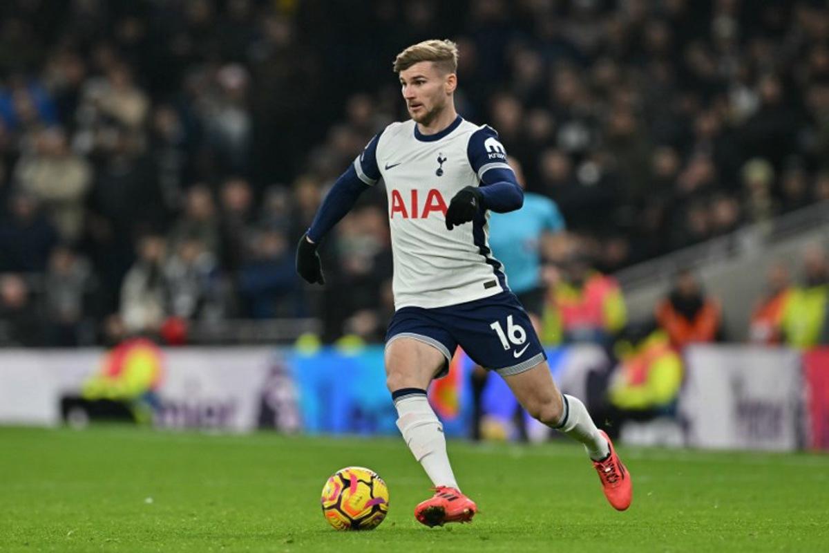 Tottenham Hotspur's German striker #16 Timo Werner runs with the ball during the English Premier League football match between Tottenham Hotspur and Wolverhampton Wanderers at the Tottenham Hotspur Stadium in London, on December 29, 2024.  Glyn KIRK / AFP
