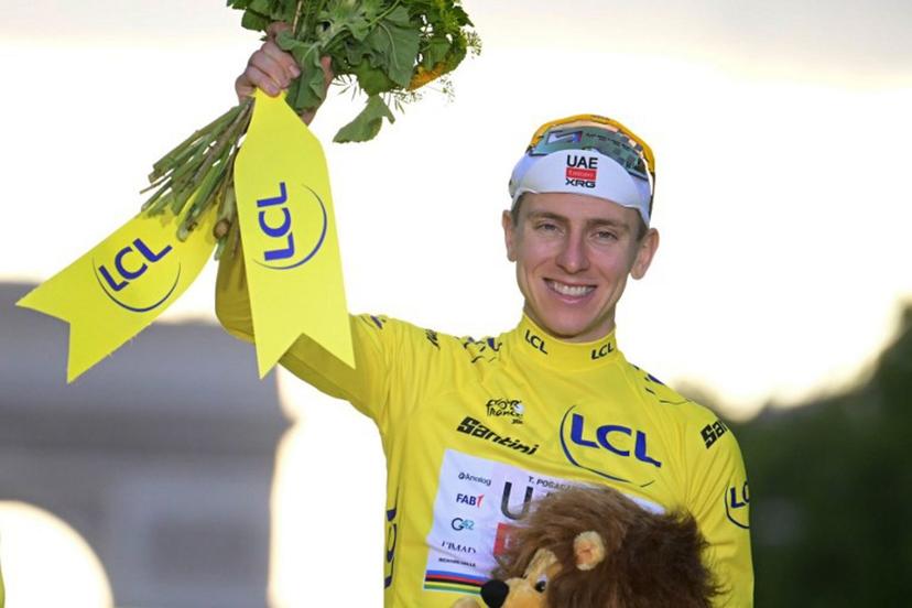 UAE Team Emirates - XRG's Slovenian rider Tadej Pogacar celebrates on the podium with the overall leader's yellow jersey after the 21st stage of the 113th edition of the Tour de France cycling race, 88,7 km starting and finishing in Paris, on July 26, 2026.  Bernard PAPON / POOL / AFP