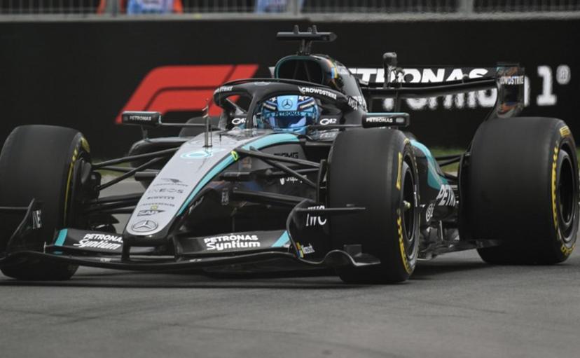 Mercedes' British driver George Russell races during the Sprint race ahead of the 2026 Formula 1 Grand Prix du Canada at Circuit Gilles-Villeneuve in Montreal, Canada, on May 23, 2026.   Andrej Ivanov / AFP