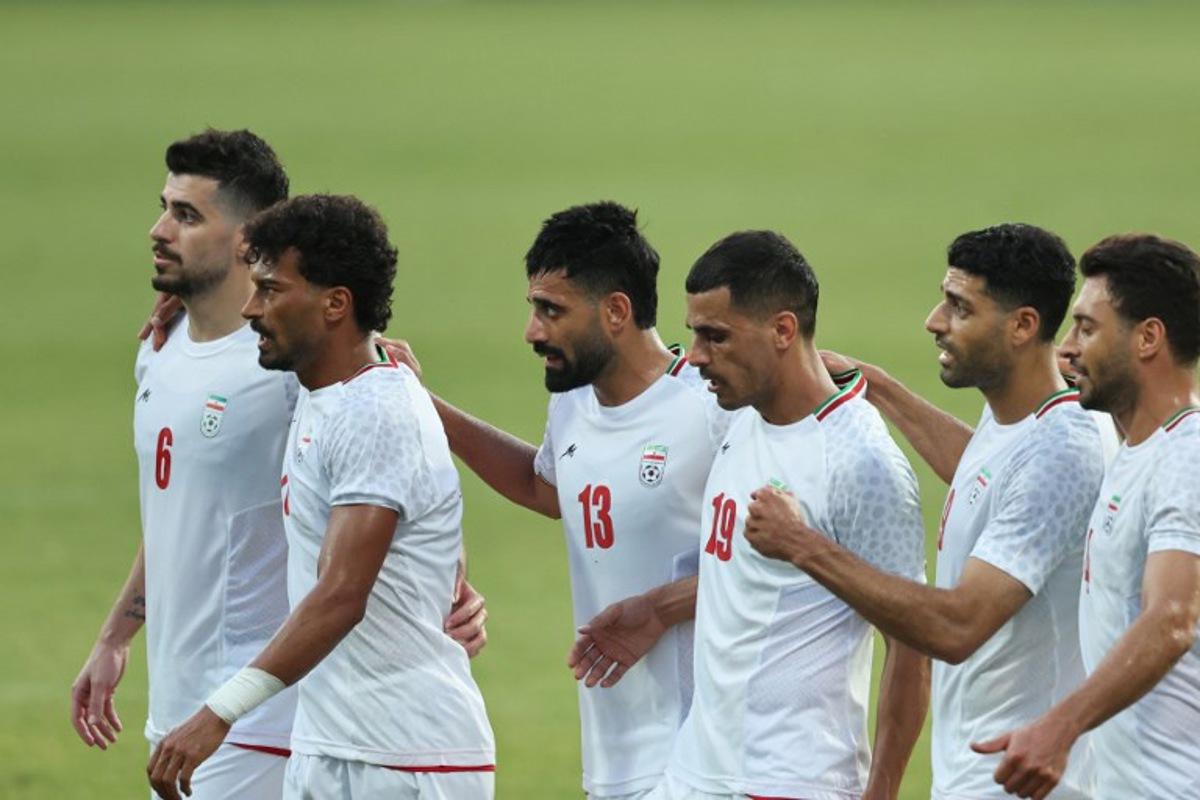 Iran's Forward #23 Ramin Rezaeian celebrates with teammates after scoring their side's second goal during an international friendly football match between Iran and Gambia, in Antalya, southern Turkey, May 29, 2026, as part of Iran's preparation for the upcoming football World Cup.  Oner SAN / AFP