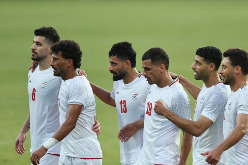 Iran's Forward #23 Ramin Rezaeian celebrates with teammates after scoring their side's second goal during an international friendly football match between Iran and Gambia, in Antalya, southern Turkey, May 29, 2026, as part of Iran's preparation for the upcoming football World Cup.  Oner SAN / AFP