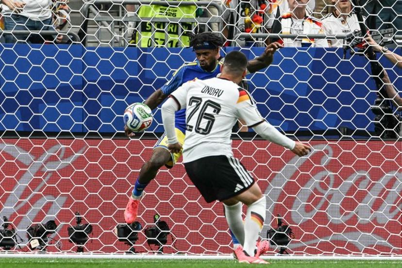 Germany's forward #26 Deniz Undav (R) scores his team's sixth goal  during the 2026 World Cup Group E football match between Germany and Curacao at the Houston Stadium in Houston on June 14, 2026.   RONALDO SCHEMIDT / AFP