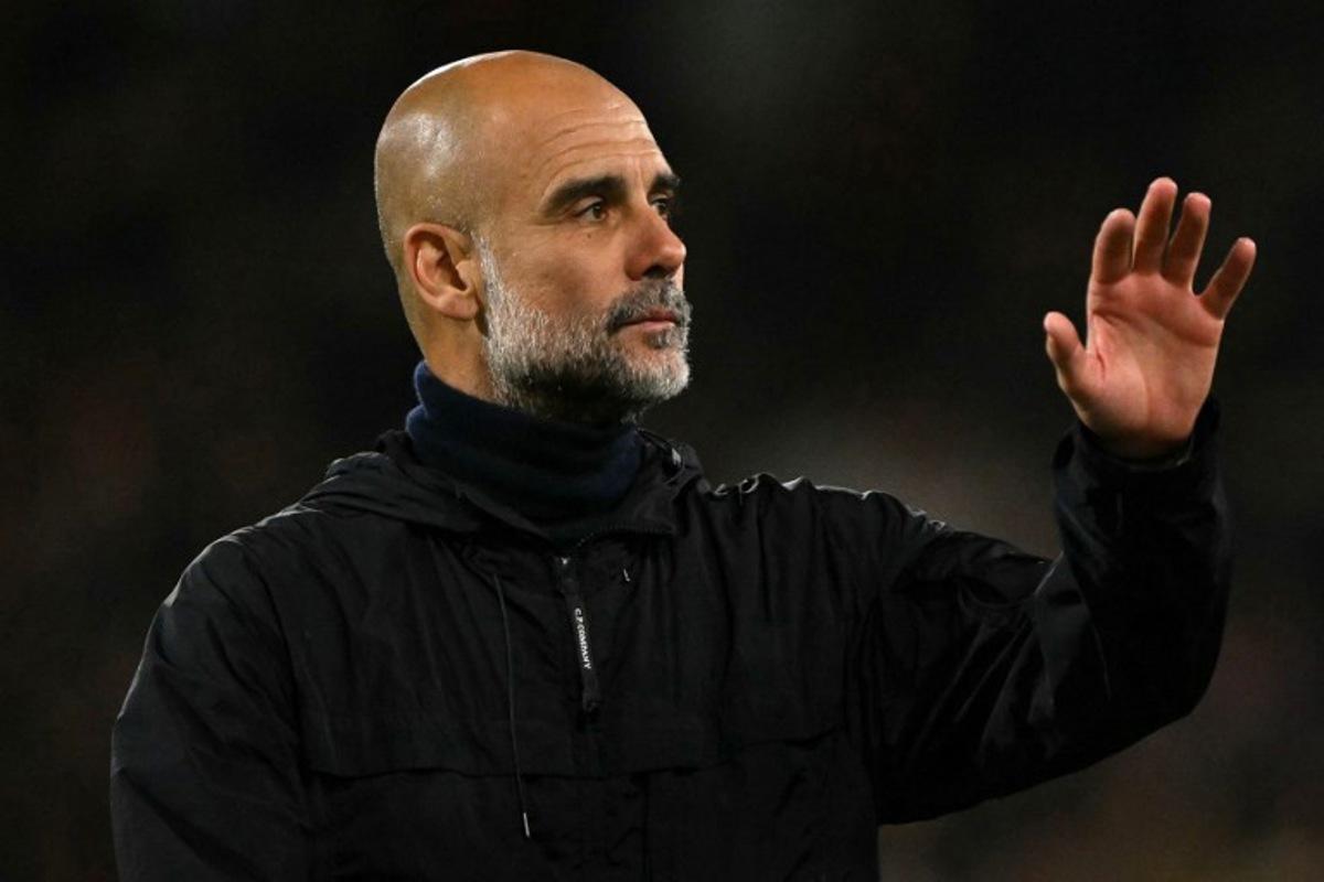 Manchester City's Spanish manager Pep Guardiola reacts after the English Premier League football match between Bournemouth and Manchester City at the Vitality Stadium in Bournemouth, southern England on May 19, 2026.  Glyn KIRK / AFP