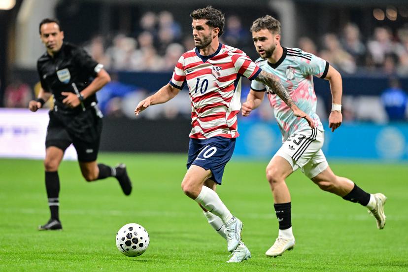 US's Christian Pulisic and Belgium's Nicolas Raskin fight for the ball during a friendly soccer game between the United States national team and Belgian national soccer team Red Devils in Atlanta, on Saturday 28 March 2026, in preparation for the 2026 World Cup. BELGA PHOTO DIRK WAEM