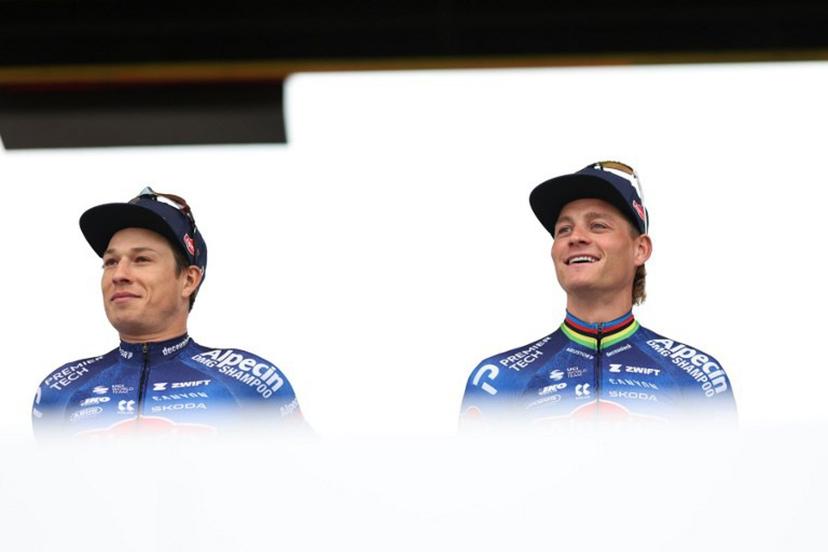 Alpecin-Premier Tech's Belgian rider Jasper Philipsen (L) and Alpecin-Premier Tech's Dutch rider Mathieu van der Poel stand on stage during  the teams' presentations event on the eve of the 123rd edition of the Paris-Roubaix one-day classic cycling race, 258.3 km between Compiegne and Roubaix, in Compiegne, northern France, on April 11, 2026.  Anne-Christine POUJOULAT / AFP