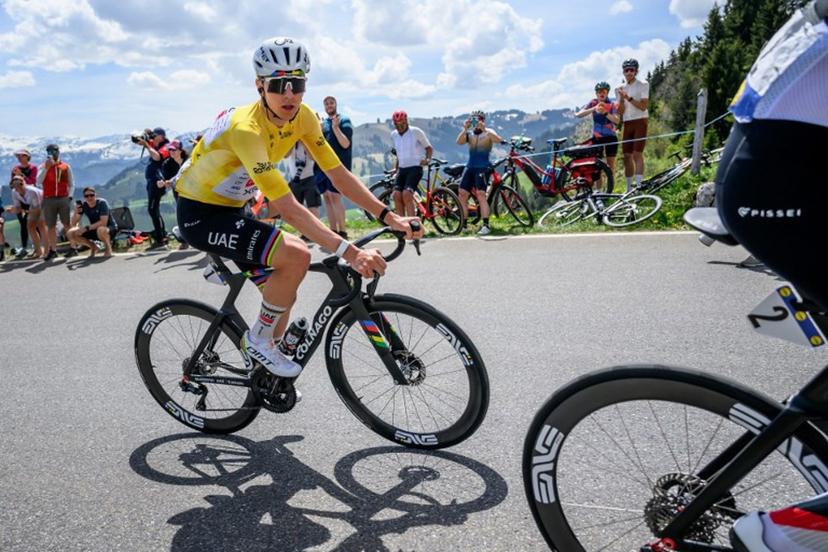 UAE Team Emirates-XRG's Slovenian rider Tadej Pogacar climbs the Jaunpass during the fourth stage of the Tour of Romandie UCI cycling World tour, 149.6 km from Broc and to Charmey, in Jaunpass, Switzerland, on May, 2, 2026.  Fabrice COFFRINI / AFP