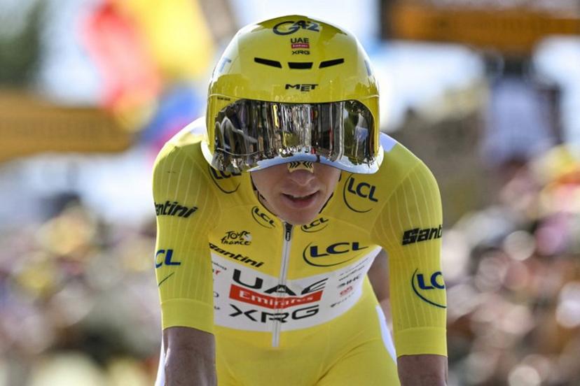 UAE Team Emirates - XRG's Slovenian rider Tadej Pogacar wearing the overall leader's yellow jersey cycles past the Lac Leman during the 16th stage of the 113th edition of the Tour de France cycling race, 26,1 km time trial between Évian-les-Bains and Thonon-les-Bains in the French Alps, on July 21, 2026.  Jeff PACHOUD / AFP