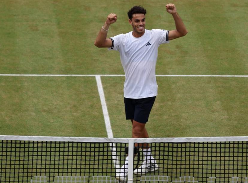 Argentina's Francisco Cerundolo celebrates winning against US player Brandon Nakashima during their men's singles semi-final tennis match on day six of the ATP HSBC Championships at Queen's Club in west London on June 20, 2026. Cerundolo won the match 6-7, 6-3, 6-4. Adrian Dennis / AFP