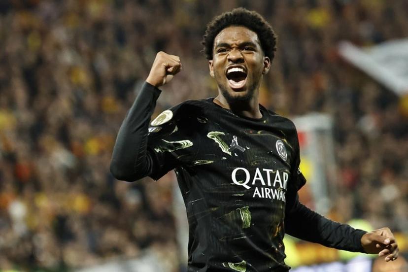 Paris Saint-Germain's French forward #49 Ibrahim Mbaye celebrates after scoring a goal during the French L1 football match between RC Lens and Paris Saint-Germain (PSG) at the Stade Bollaert-Delelis stadium in Lens on May 13, 2026.  SIMON WOHLFAHRT / AFP