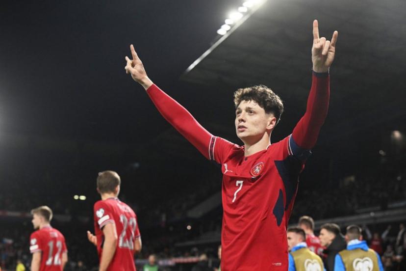 Czech Republic's defender #07 Ladislav Krejci celebrates after scoring the 2-1 goal during the first period of extra time during the FIFA World Cup 2026 European qualification final football match Czech Republic vs Denmark on March 31, 2026 in Prague, Czech Republic.  Michal Cizek / AFP