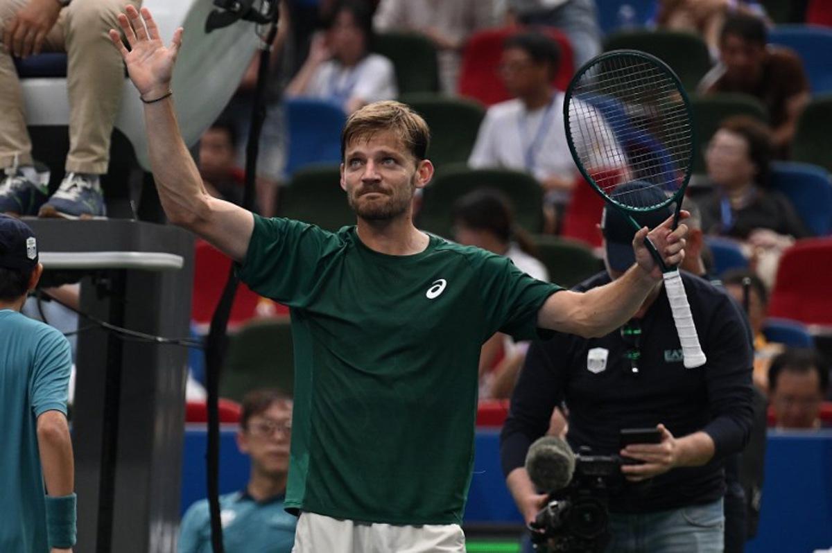 Belgium's David Goffin reacts after victory against USA's Ben Shelton during their men's singles match at the Shanghai Masters tennis tournament in Shanghai on October 3, 2025.  Jade Gao / AFP