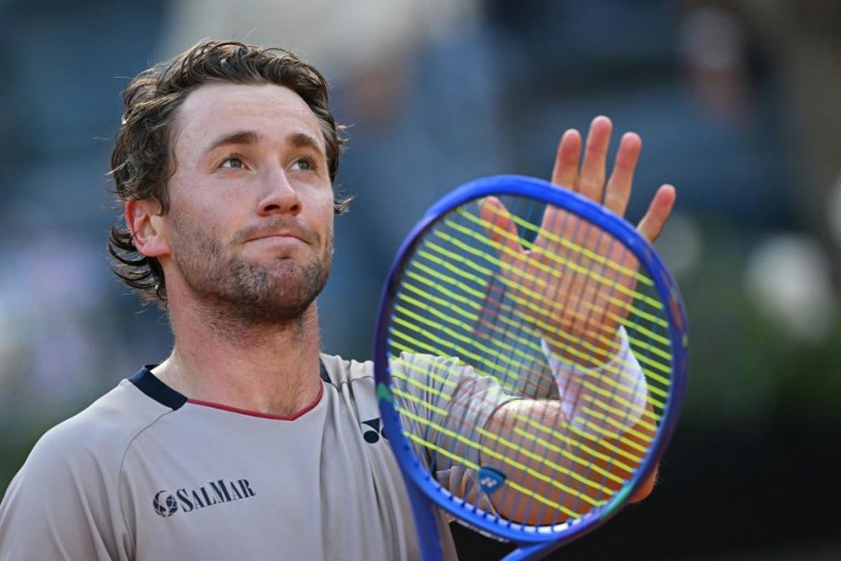 Norway's Casper Ruud celebrates after winning the semi-final against Italy's Luciano Darderi during the ATP Rome Open tennis tournament at Foro Italico in Rome on May 15, 2026.   Tiziana FABI / AFP