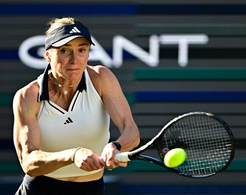 Ukraine's Elina Svitolina returns the ball to the Philippines' Alexandra Eala during the women's singles quarter-final match at the WTA500 Berlin Tennis Open tournament in Berlin on June 19, 2026.  Tobias SCHWARZ / AFP