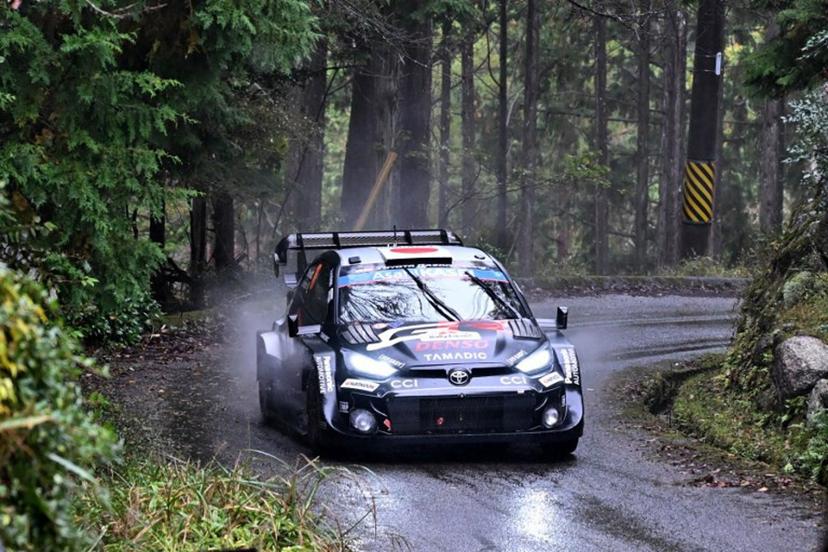 Takamoto Katsuta of Japan and his co-driver Aaron Johnston of Ireland drive their Toyota GR Yaris Rally1 during the SS19 Nukata section of the Rally Japan, the 13th round of the FIA World Rally Championships, in Toyota city, Aichi prefecture on November 9, 2025.  Toshifumi KITAMURA / AFP