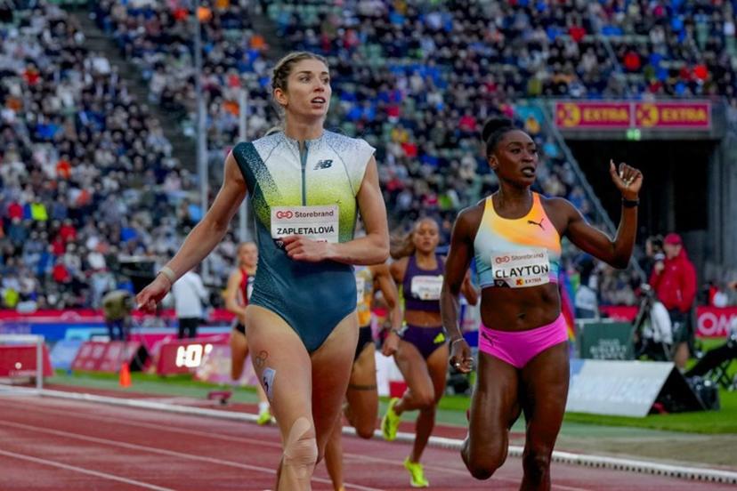 Slovakia's Emma Zapletalova (L) celebrates winning ahead of Jamaica's Rushell Clayton in the Women's 400m Hurdles event of the Olso Diamond League athletics meeting in Oslo, Norway, on June 10, 2026.  Heiko Junge / NTB / AFP