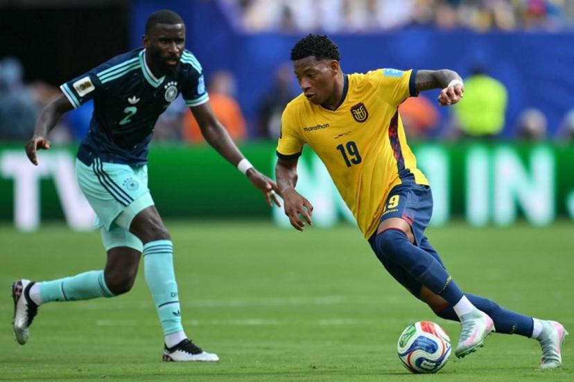 Germany's defender #02 Antonio Ruediger and Ecuador's midfielder #19 Gonzalo Plata fight for the ball during the 2026 World Cup Group E football match between Ecuador and Germany at the New York/New Jersey Stadium in East Rutherford on June 25, 2026.  ANGELA WEISS / AFP