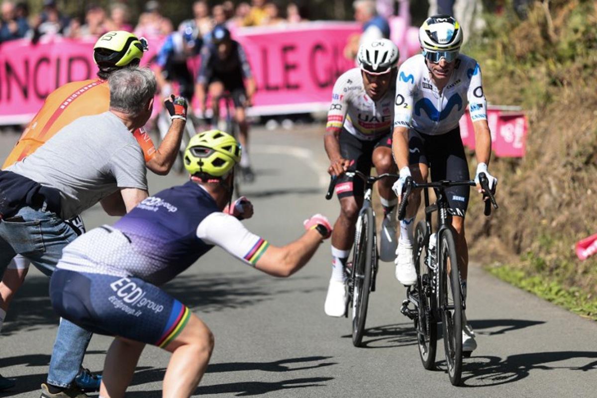 Movistar Team Spanish rider Enric Mas and UAE Team Emirates - XRG Ecuadorian rider Jhonatan Narvaez (L) ride in a breakaway during the 11th stage of the Giro d'Italia 2026 - Tour of Italy cycling race between Porcari and Chiavari, Italy, on May 20, 2026.  Luca Bettini / AFP