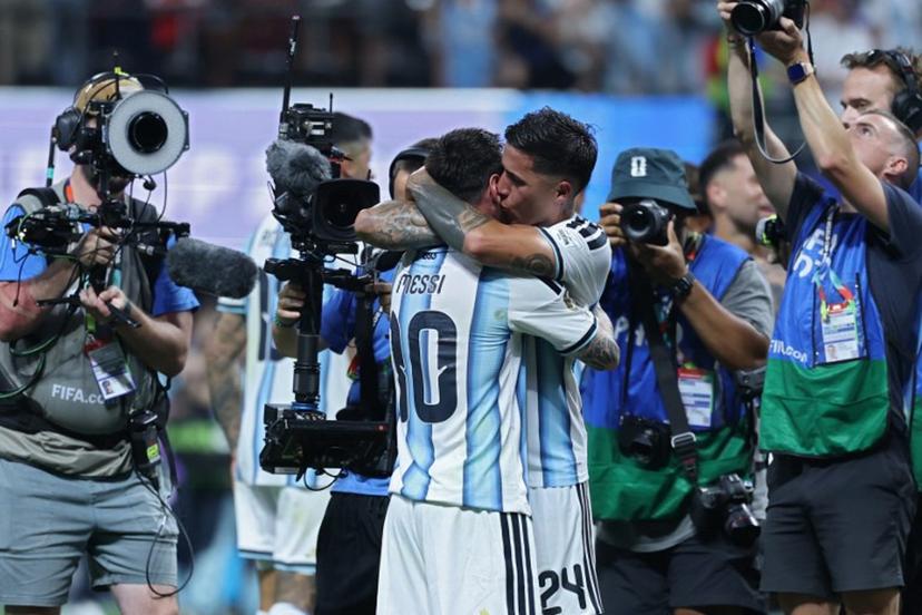 Argentina's forward #10 Lionel Messi celebrates with Argentina's midfielder #24 Enzo Fernandez after winning the 2026 World Cup round of 16 football match between Argentina and Egypt at Atlanta Stadium in Atlanta on July 7, 2026.   Thomas COEX / AFP