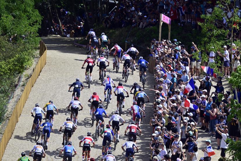 Riders pictured in action at the start of the men's cross-country mountain bike cycling race at the Paris 2024 Olympic Games, at the Colline d'Elancourt climb near Paris, France on Monday 29 July 2024. The Games of the XXXIII Olympiad are taking place in Paris from 26 July to 11 August. The Belgian delegation counts 165 athletes competing in 21 sports. BELGA PHOTO DIRK WAEM