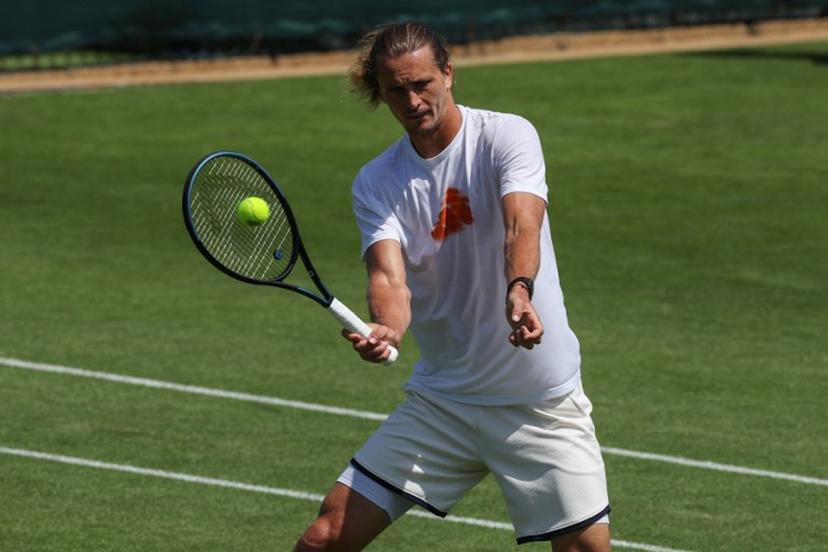 Germany's Alexander Zverev hits a shot at the practice courts at The All England Lawn Tennis and Croquet Club in Wimbledon, southwest London, on June 25, 2026, ahead of the 2026 Wimbledon Championships.  Adrian Dennis / AFP