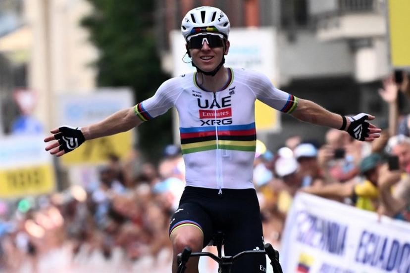 Slovenia's rider Tadej Pogacar of team UAE Emirates - XRG celebrates as he crosses the finish line to win the first stage of the Men's Tour of Switzerland (Tour de Suisse) cycling race, in Sondrio, Italy, on June 17, 2026.  Marco BERTORELLO / AFP