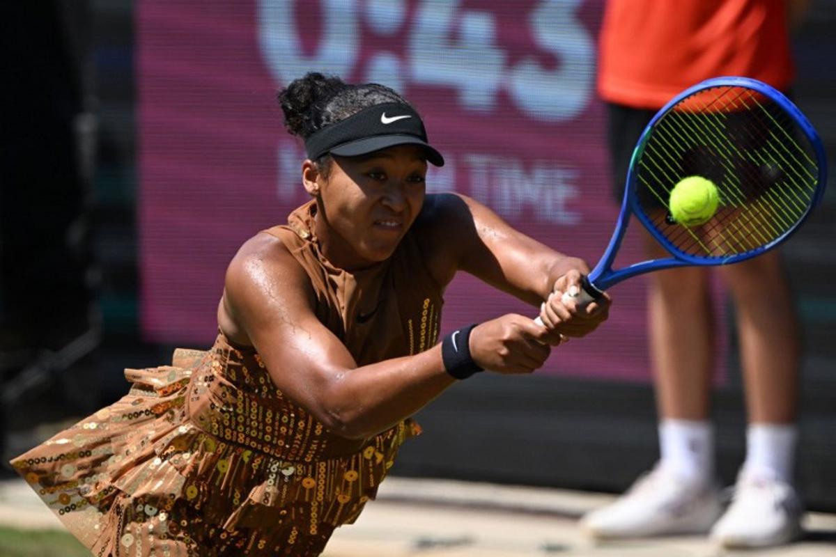 Japan's Naomi Osaka returns the ball to Russia's Ekaterina Alexandrova during the women's singles quarter-final match of the WTA 500 Bad Homburg Open tennis tournament in Bad Homburg, western Germany on June 25, 2026.  Kirill KUDRYAVTSEV / AFP