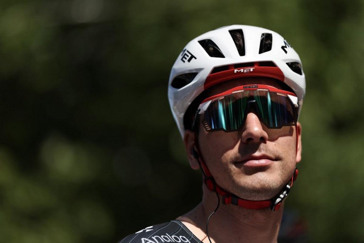 UAE Team Emirates XRG's Portuguese rider Joao Almeida awaits the start of the 2nd stage of the Tour Auvergne-Rhone-Alpes cycling race (formerly known as the Criterium du Dauphine), 234,3km between Saint-Martin-Le-Vinoux and Le Puy-en-Velay, in the French Alps, on June 8, 2026.  Anne-Christine POUJOULAT / AFP