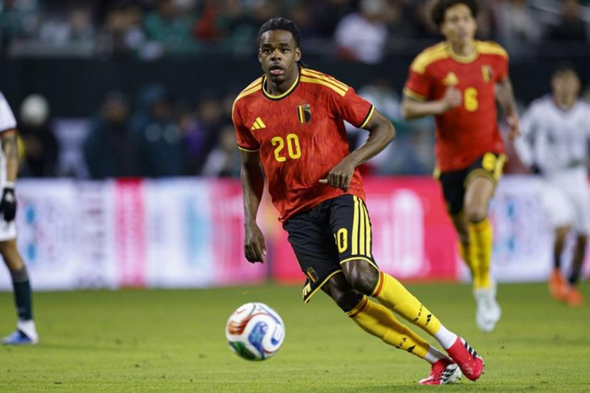 Belgium's defender #20 Nathan Ngoy passes the ball during a friendly football match between Mexico and Belgium at Soldier Field in Chicago, Illinois, on March 31, 2026.  KAMIL KRZACZYNSKI / AFP
