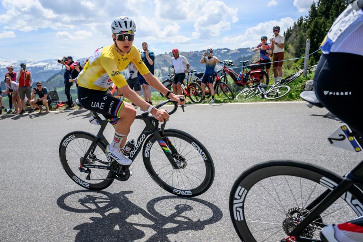 UAE Team Emirates-XRG's Slovenian rider Tadej Pogacar climbs the Jaunpass during the fourth stage of the Tour of Romandie UCI cycling World tour, 149.6 km from Broc and to Charmey, in Jaunpass, Switzerland, on May, 2, 2026.  Fabrice COFFRINI / AFP