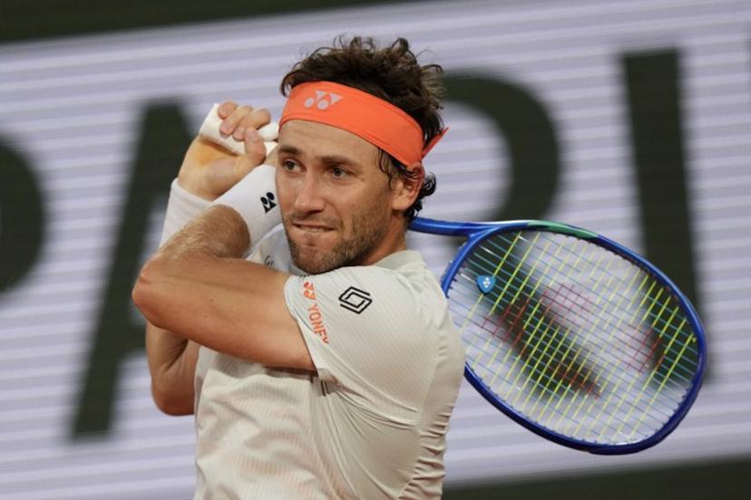 Norway's Casper Ruud plays a backhand return to Brazil's Joao Fonseca during their men's singles match on day 8 of the French Open tennis tournament on Court Philippe-Chatrier at the Roland-Garros Complex in Paris on May 31, 2026.  Dimitar DILKOFF / AFP