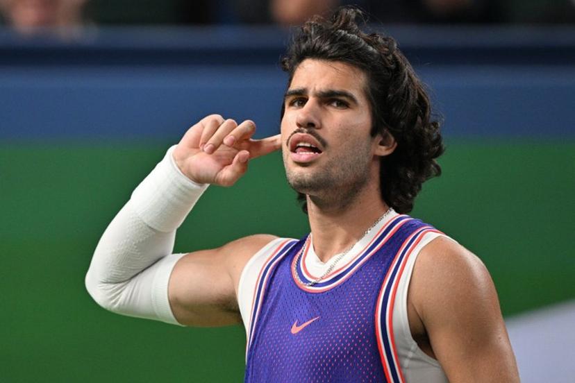 Spain's Carlos Alcaraz reacts during his men's singles match against Belgium's Zizou Bergs at the Shanghai Masters tennis tournament in Shanghai on October 12, 2026.  Hector RETAMAL / AFP