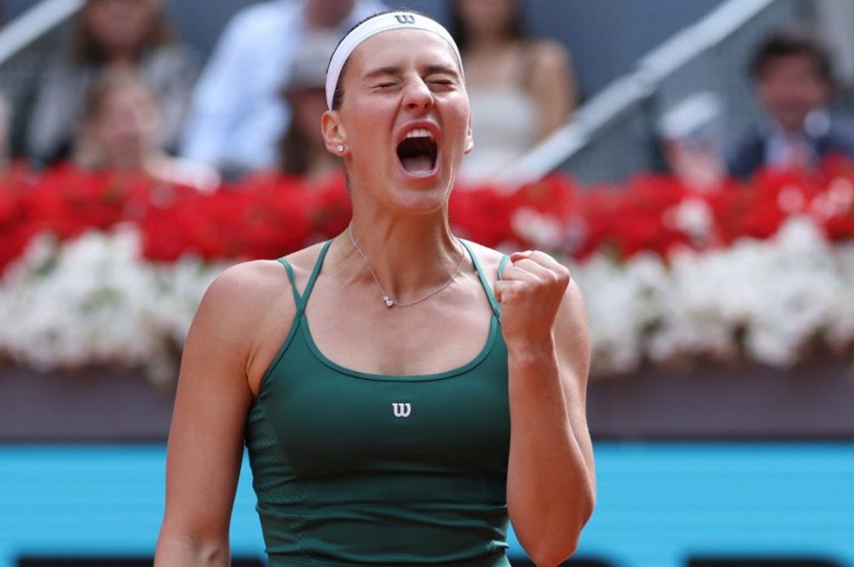 Ukraine's Marta Kostyuk reacts as she plays against Russia's Mirra Andreeva during the 2026 WTA Tour Madrid Open tennis tournament final singles match at the Caja Magica in Madrid, on May 2, 2026.  Thomas COEX / AFP