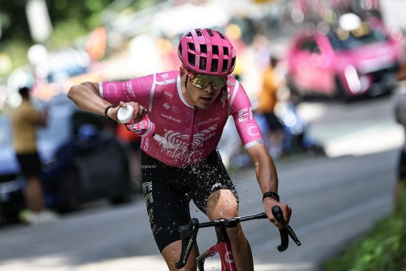 EF Education - EasyPost's French rider Alex Baudin cool down with water as he cycles in a breakaway during the 1st stage of the Tour Auvergne-Rhone-Alpes cycling race (formerly known as the Criterium du Dauphine), 146,2km between Vizille and Saint-Ismier, in the French Alps, on June 7, 2026.  Anne-Christine POUJOULAT / AFP