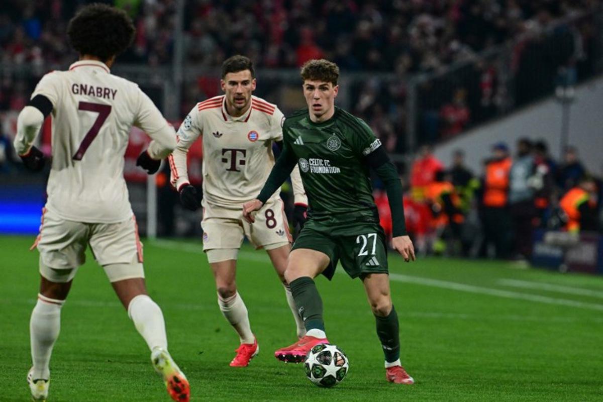 Celtic's Belgian midfielder #27 Arne Engels (R), Bayern Munich's German midfielder #08 Leon Goretzka and Bayern Munich's German forward #07 Serge Gnabry vie for the ball during the UEFA Champions League second-leg, knockout phase play-off match FC Bayern Munich vs Celtic on February 18, 2025 in Munich.  Tobias SCHWARZ / AFP