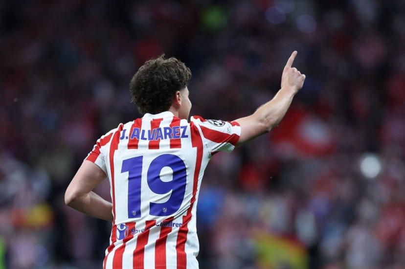 Atletico Madrid's Argentine forward #19 Julian Alvarez celebrates scoring an equalizing goal during the UEFA Champions League semi-final first leg football match between Club Atletico de Madrid and Arsenal at the Metropolitano stadium in Madrid on April 29, 2026.  Thomas COEX / AFP