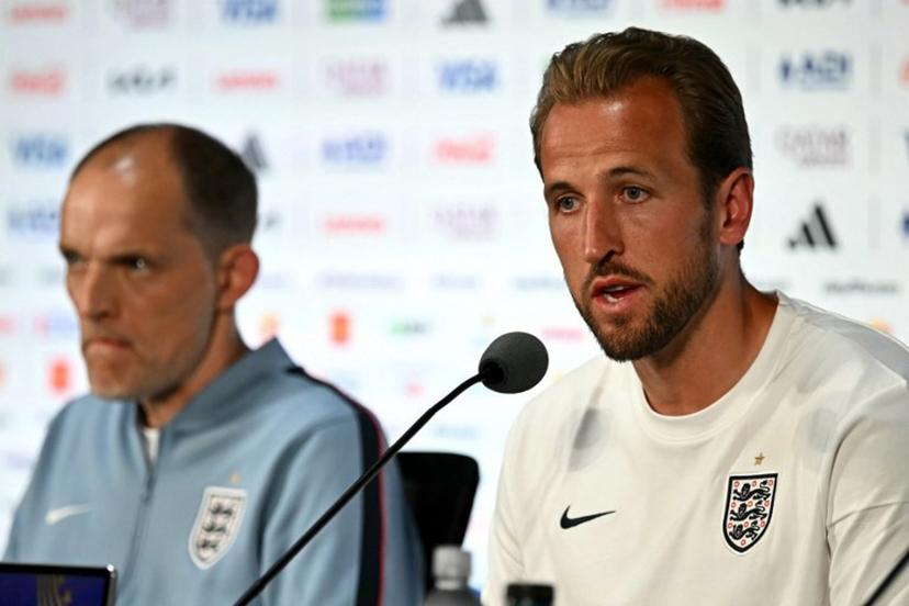 England's forward #09 Harry Kane (R) gives an MD-1 press conference next to German head coach Thomas Tuchel (L) at the Dallas Stadium in Arlington on June 16, 2026, on the eve of the 2026 World Cup Group L football match between England and Croatia.  Paul ELLIS / AFP