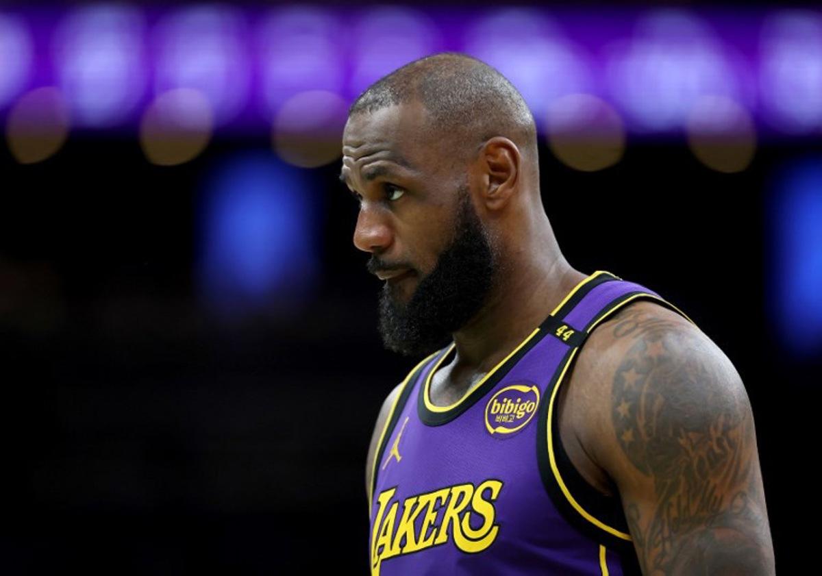 (FILES) LeBron James #23 of the Los Angeles Lakers gets into position during the second half against the Boston Celtics at TD Garden on March 8, 2025 in Boston, Massachusetts. NOTE TO USER: User expressly acknowledges and agrees that, by downloading and or using this photograph, User is consenting to the terms and conditions of the Getty Images License Agreement.   Elsa/Getty Images/AFP Los Angeles Lakers superstar LeBron James is expected to miss at least one to two weeks with a groin strain, ESPN reported on March 9, 2025.cJames, the NBA's all-time leading scorer, exited the Lakers' loss to the Boston Celtics on Saturday in the fourth quarter.  ELSA / GETTY IMAGES NORTH AMERICA / AFP