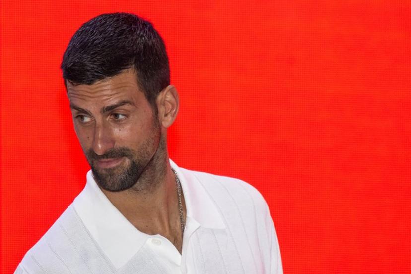 Serbian tennis player Novak Djokovic is seen in the pitlane after the sprint race ahead of the Formula One Qatar Grand Prix at the Lusail International Circuit in Lusail on November 29, 2025.  Andrej ISAKOVIC / AFP
