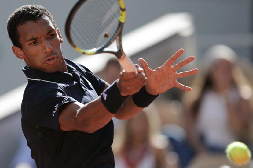 Canada's Felix Auger-Aliassime plays a forehand return to Chile's Alejandro Tabilo during their men's singles match on day 9 of the French Open tennis tournament on Court Philippe-Chatrier at the Roland-Garros Complex in Paris on June 1, 2026.  Thomas SAMSON / AFP