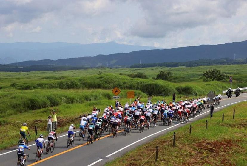 A general view shows the peloton riding during the men's cycling road race of the Tokyo 2020 Olympic Games finishing at the Fuji International Speedway in Oyama, Japan, on July 24, 2021.   Tim de Waele / POOL / AFP