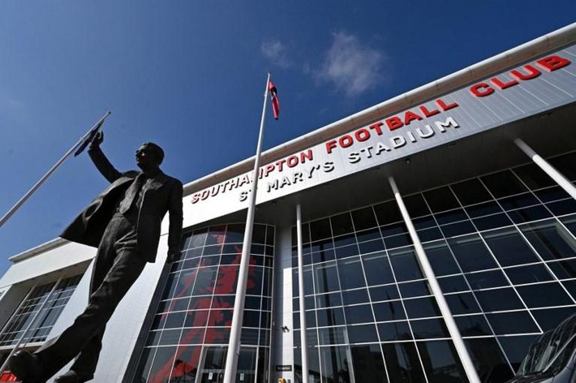 A statue of Ted Bates, a former player, manager and president of Southampton football club, is seen ahead of the English Premier League football match between Southampton and Burnley at St Mary's Stadium in Southampton, southern England on April 4, 2021.  Glyn KIRK / POOL / AFP RESTRICTED TO EDITORIAL USE. No use with unauthorized audio, video, data, fixture lists, club/league logos or 'live' services. Online in-match use limited to 120 images. An additional 40 images may be used in extra time. No video emulation. Social media in-match use limited to 120 images. An additional 40 images may be used in extra time. No use in betting publications, games or single club/league/player publications.

