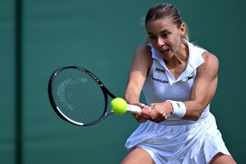 Poland's Maja Chwalinska returns the ball to Thailand's Mananchaya Sawangkaew during their women's singles first round tennis match on the first day of the 2026 Wimbledon Championships at The All England Lawn Tennis and Croquet Club in Wimbledon, southwest London, on June 29, 2026.  Kirill KUDRYAVTSEV / AFP