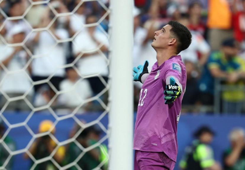Paraguay's goalkeeper #12 Orlando Gill (L) reacts after saving a penalty by Germany's forward #11 Nick Woltemade (out of frame) in the shootout during the 2026 World Cup round of 32 football match between Germany and Paraguay at the Boston Stadium in Foxborough on June 29, 2026.   FRANCK FIFE / AFP