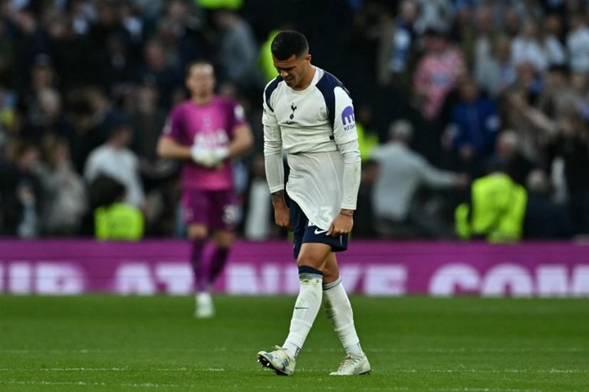 Tottenham Hotspur's Spanish defender #23 Pedro Porro reacts on the final whistle in the English Premier League football match between Tottenham Hotspur and Brighton and Hove Albion at the Tottenham Hotspur Stadium in London, on April 18, 2026. The game finished 2-2. Ben STANSALL / AFP